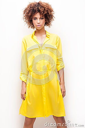 https://thumbs.dreamstime.com/x/girl-afro-yellow-dress-sexy-beautiful-african-american-posing-fashionable-woman-glamour-makeup-studio-shot-69764658.jpg