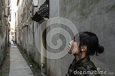 Girl in the alley Stock Photo