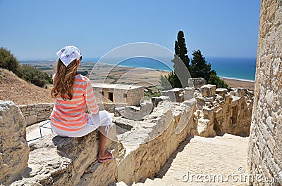 Girl among ancient ruines Stock Photo