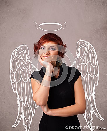 Girl with angel illustrated wings on grungy background Stock Photo