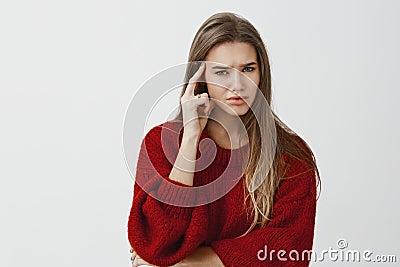 Girl annoyed, do not want continue conversation. Bothered displeased caucasian female entrepreneur in loose sweater Stock Photo