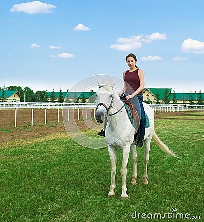 Girl astride a horse Stock Photo