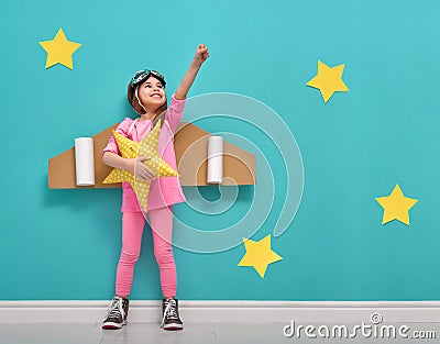 Girl in an astronaut costume Stock Photo