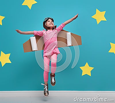 Girl in an astronaut costume Stock Photo