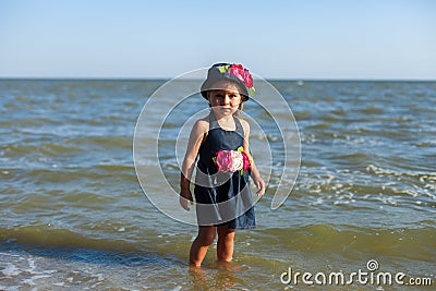 Girl on the beach by the sea Stock Photo