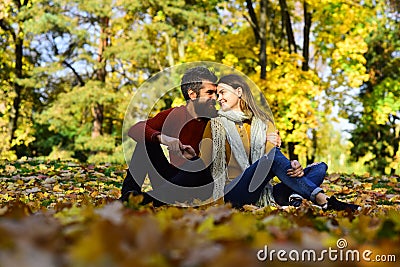 Passionate love in the autumn park. Young couple Stock Photo