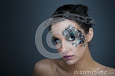 Girl with beautiful artistic face painting Stock Photo