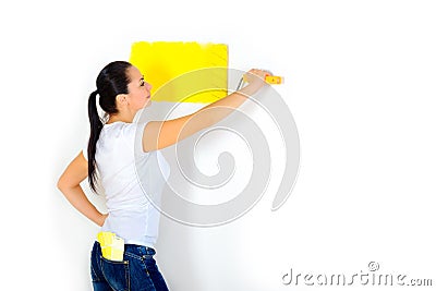 Girl began to paint the walls Stock Photo