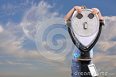 Girl behind telescope Stock Photo