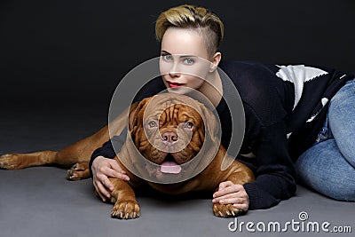 Girl with big brown dog Stock Photo