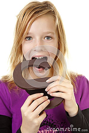 Girl with big chocolate letter Stock Photo