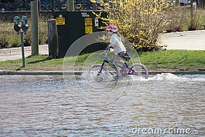 Girl on Bike Editorial Stock Photo