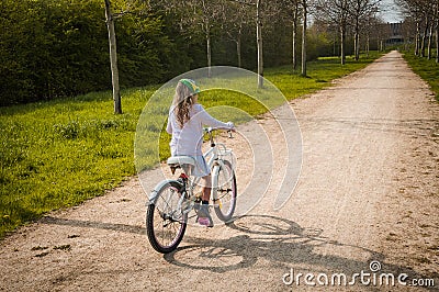 Girl on bike Stock Photo