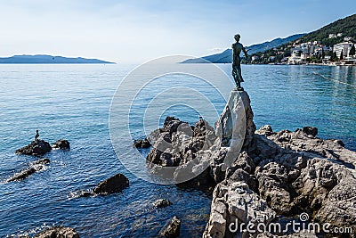 A girl with a bird on her hands Stock Photo