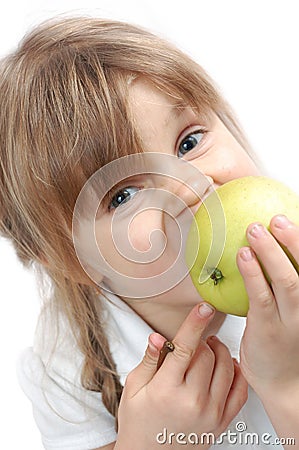 Girl biting an apple Stock Photo