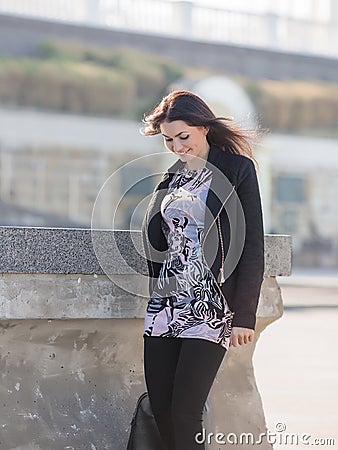 Girl in black trousers on open air Stock Photo