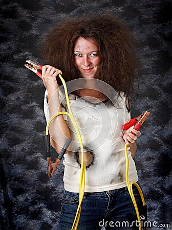 Girl with booster cable Stock Photo