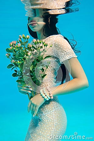 Girl with a bouquet Stock Photo