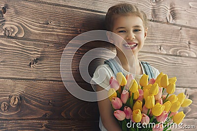 Girl with a bouquet of tulips Stock Photo