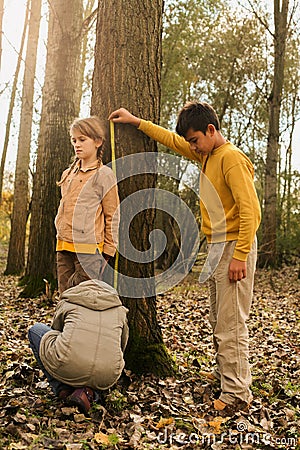 Two cute girls and boy. Stock Photo