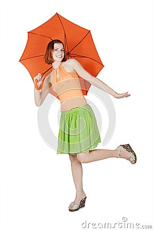 Girl in bright clothes with umbrella Stock Photo
