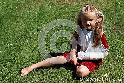 Girl with broken hand Stock Photo