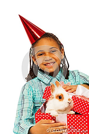 Girl with bunny in present box, isolated on white Stock Photo