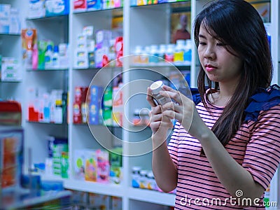 Girl buy drug Stock Photo
