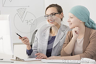 Girl with cancer and employer Stock Photo