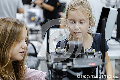 Girl caucasoid education electronic robotic on table at class room. learning innovation robot electronic for future AI. System Stock Photo