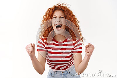 Girl cheering devoted fan visit awesome game yelling yeah encourage score goal clench fists victory celebration, look Stock Photo