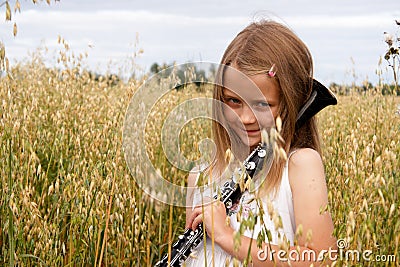 Girl with clarinet Stock Photo