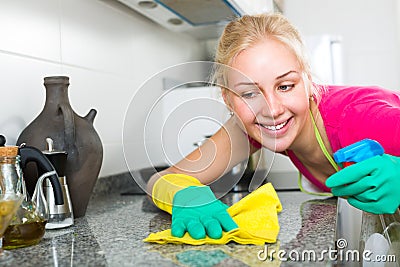 Girl cleaning in apartment Stock Photo