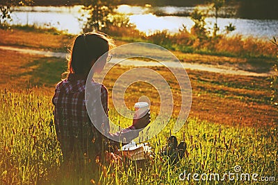 Girl with coffee cup and book Stock Photo