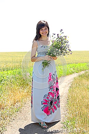 The girl collects a flowers Stock Photo