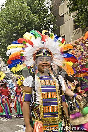 Girl in a colourful costume at the Carnival Editorial Stock Photo