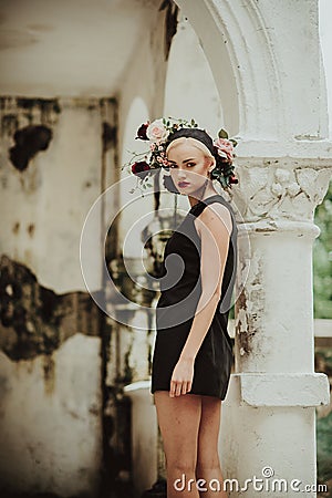 Girl at the column Stock Photo