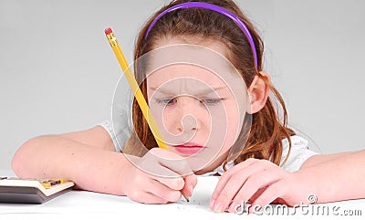 Girl Concentrating Stock Photo