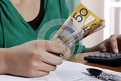 Girl counting money Stock Photo