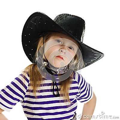 Girl cowboy in a black hat Stock Photo