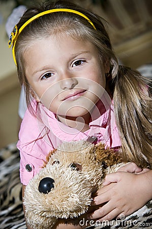 Girl with cuddly toy Stock Photo