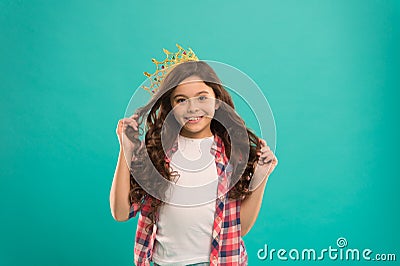 Girl cute baby wear crown while stand blue background. Every girl dreaming to be princess. Lady little princess. Dreams Stock Photo