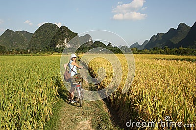 Girl Cycling in China country Stock Photo