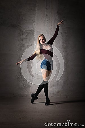 Girl dancer in an elegant, unusual pose.healthy lifestyle, Life in Art, a great body, choreography Stock Photo