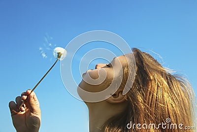 Girl with a Dandelion Stock Photo