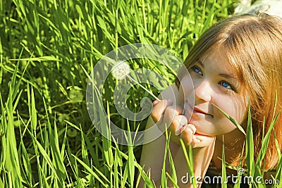 Girl with a Dandelion Stock Photo