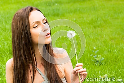 Girl with dandelion Stock Photo