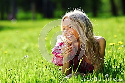 Girl with dandelion Stock Photo