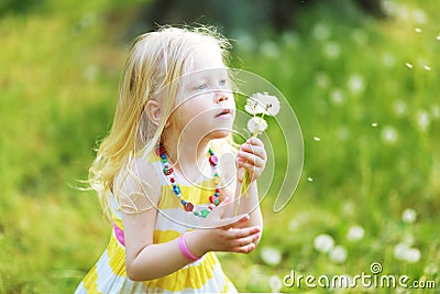 Girl with dandelion Stock Photo