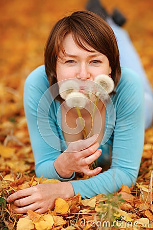 Girl with a dandelion Stock Photo